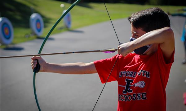 Student fires an arrow